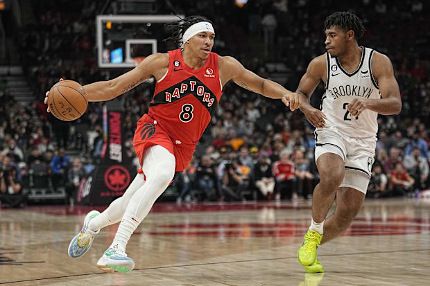 Toronto Raptors guard Ron Harper Jr. (8) drives to the basket against Brooklyn Nets guard Cam Thomas (24).