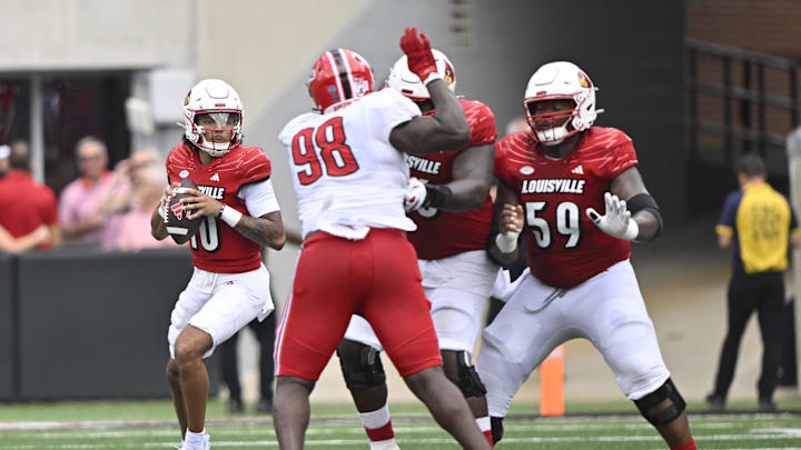 Aug 31, 2024; Louisville, Kentucky, USA;  Louisville Cardinals quarterback Pierce Clarkson (10) looks to pass during the second half at L&N Federal Credit Union Stadium. Louisville defeated Austin Peay 62-0. Mandatory Credit: Jamie Rhodes-Imagn Images