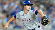May 3, 2024; Kansas City, Missouri, USA; Texas Rangers pitcher Cole Winn (60) pitches during the seventh inning against the Kansas City Royals at Kauffman Stadium.