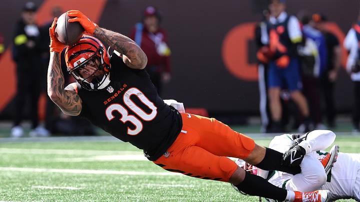 Oct 26, 2025; Cincinnati, Ohio, USA; Cincinnati Bengals running back Chase Brown (30) scores a touchdown during the second quarter against the New York Jets at Paycor Stadium. Mandatory Credit: Joseph Maiorana-Imagn Images