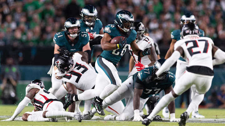 Barkley runs with the ball against the Atlanta Falcons during the first quarter at Lincoln Financial Field.