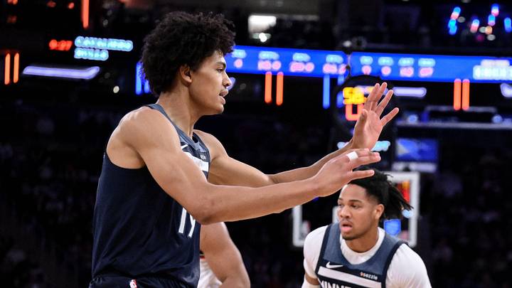 Oct 9, 2025; New York, New York, USA; New York Knicks guard Jordan Clarkson (00) tries to drive past Minnesota Timberwolves guard Jules Bernard (14) during the second half at Madison Square Garden. Mandatory Credit: John Jones-Imagn Images