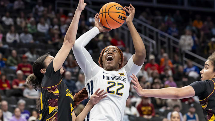 Mar 6, 2026; Kansas City, MO, USA; West Virginia forward Kierra Wheeler (22) attempts a contested shot against Arizona State during the first half at T-Mobile Center. Mandatory Credit: Nick Tre. Smith-Imagn Images