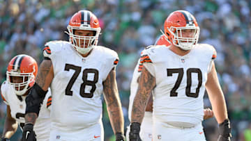 Oct 13, 2024; Philadelphia, Pennsylvania, USA; Cleveland Browns offensive tackle Jack Conklin (78) and guard Zak Zinter (70) against the Philadelphia Eagles at Lincoln Financial Field. Mandatory Credit: Eric Hartline-Imagn Images