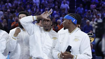 Oct 21, 2025; Oklahoma City, Oklahoma, USA; Oklahoma City Thunder guard Jalen Williams (8) gestures while Oklahoma City Thunder guard Shai Gilgeous-Alexander (2) looks at him during the NBA Championship ring ceremony at Paycom Center. Mandatory Credit: Alonzo Adams-Imagn Images