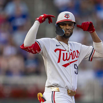 Jul 9, 2025; Minneapolis, Minnesota, USA; Minnesota Twins left fielder Willi Castro (50) celebrates hitting a double against the Chicago Cubs in the fifth inning at Target Field. Mandatory Credit: Jesse Johnson-Imagn Images