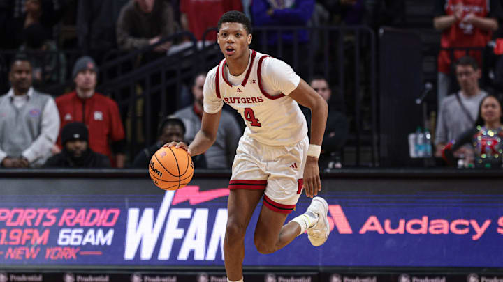Feb 12, 2025; Piscataway, New Jersey, USA; Rutgers Scarlet Knights guard Ace Bailey (4) dribbles up court during the second half against the Iowa Hawkeyes at Jersey Mike's Arena. Mandatory Credit: Vincent Carchietta-Imagn Images