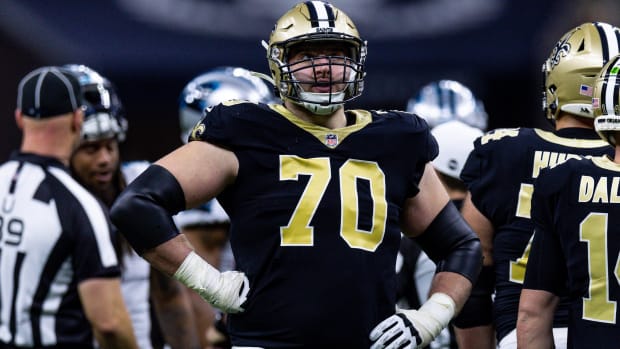 New Orleans Saints offensive tackle Trevor Penning (70) looks on against the Carolina Panthers 