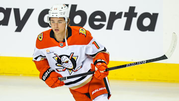 Apr 3, 2025; Calgary, Alberta, CAN; Anaheim Ducks center Trevor Zegras (11) skates during the warmup period against the Calgary Flames at Scotiabank Saddledome.