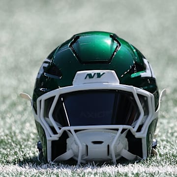 Sep 14, 2025; East Rutherford, New Jersey, USA; A New York Jets helmet sits on the field before the game against the Buffalo Bills at MetLife Stadium. Mandatory Credit: Vincent Carchietta-Imagn Images