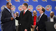 Rick Kamla (middle) announces George Raveling (left) as the winner of the John Bunn lifetime achievement award and Eddie Doncette (right) as winner of the Curt Gowdy media award for broadcasting during the 2013 basketball hall of fame finalists press conference at the Hilton Americas on Feb. 15, 2013.