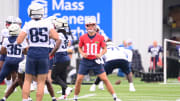 Jul 24, 2024; Foxborough, MA, USA;  New England Patriots quarterback Drake Maye (10) stretches during training camp at Gillette Stadium. Mandatory Credit: Eric Canha-USA TODAY Sports