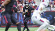 Oct 6, 2024; Houston, Texas, USA; Houston Texans quarterback C.J. Stroud (7) runs with the ball during the fourth quarter against the Buffalo Bills at NRG Stadium. Mandatory Credit: Troy Taormina-Imagn Images
