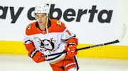 Apr 3, 2025; Calgary, Alberta, CAN; Anaheim Ducks center Trevor Zegras (11) skates during the warmup period against the Calgary Flames at Scotiabank Saddledome. Mandatory Credit: Sergei Belski-Imagn Images