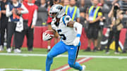 Carolina Panthers running back Rico Dowdle (5) runs the ball during the first quarter against the Arizona Cardinals at State Farm Stadium. 