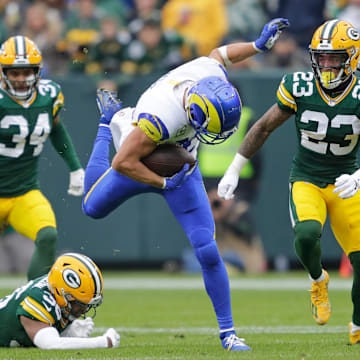 Los Angeles Rams wide receiver Cooper Kupp (10) gets a first down reception against the  Green Bay Packers in 2023.