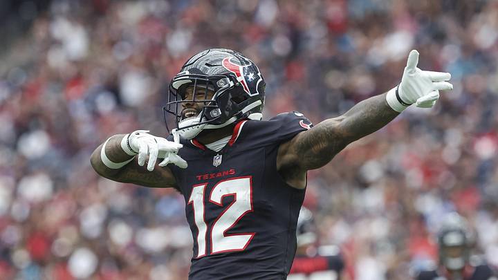 Sep 29, 2024; Houston, Texas, USA; Houston Texans wide receiver Nico Collins (12) signals after a first down during the first quarter against the Jacksonville Jaguars at NRG Stadium. Mandatory Credit: Troy Taormina-Imagn Images