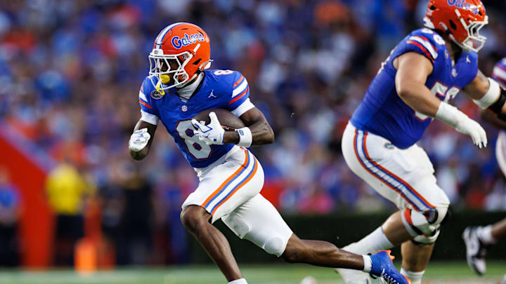 Aug 30, 2025; Gainesville, Florida, USA; Florida Gators wide receiver Vernell Brown III (8) runs with the ball against the Long Island Sharks during the first half at Ben Hill Griffin Stadium. Mandatory Credit: Matt Pendleton-Imagn Images