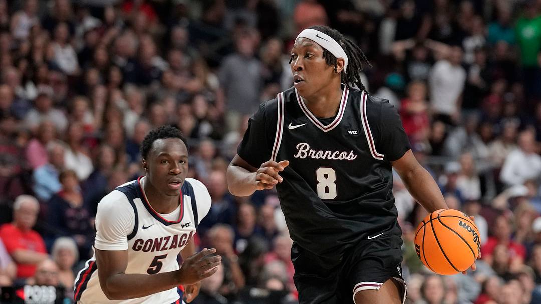 March 10, 2026; Las Vegas, NV, USA; Santa Clara Broncos forward Elijah Mahi (8) dribbles the basketball against Gonzaga Bulldogs forward Emmanuel Innocenti (5) during the second half at Orleans Arena March 10, 2026; Las Vegas, NV, USA; Santa Clara Broncos forward Elijah Mahi (8) dribbles the basketball against Gonzaga Bulldogs forward Emmanuel Innocenti (5) during the second half at Orleans Arena