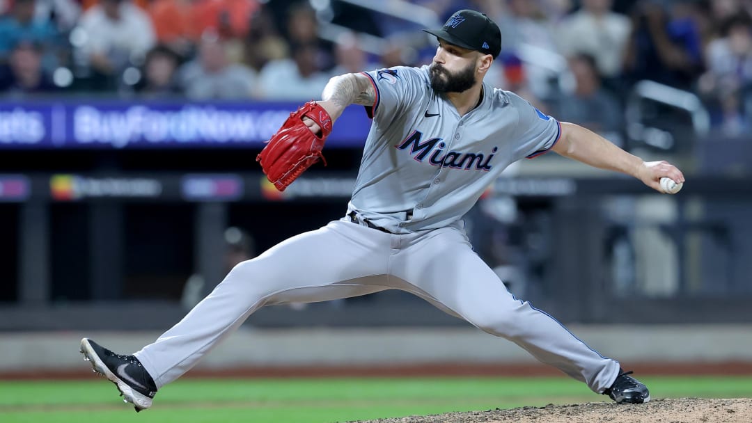 Jun 13, 2024; New York City, New York, USA; Miami Marlins relief pitcher Tanner Scott (66) pitches against the New York Mets during the ninth inning at Citi Field.