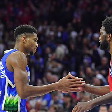 Nov 18, 2022; Philadelphia, Pennsylvania, USA; Milwaukee Bucks forward Giannis Antetokounmpo (34) and Philadelphia 76ers center Joel Embiid (21) congradulate each other after game at Wells Fargo Center. Mandatory Credit: Eric Hartline-Imagn Images