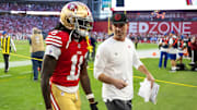 Dec 17, 2023; Glendale, Arizona, USA; San Francisco 49ers head coach Kyle Shanahan talks to wide receiver Brandon Aiyuk (11) against the Arizona Cardinals at State Farm Stadium. Mandatory Credit: Mark J. Rebilas-USA TODAY Sports