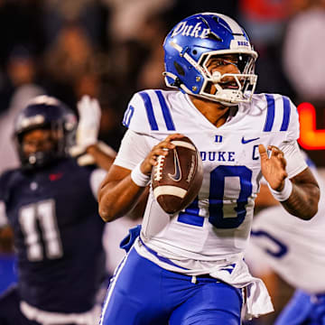 Duke is a home favorite against Virginia in Week 11 college football action.