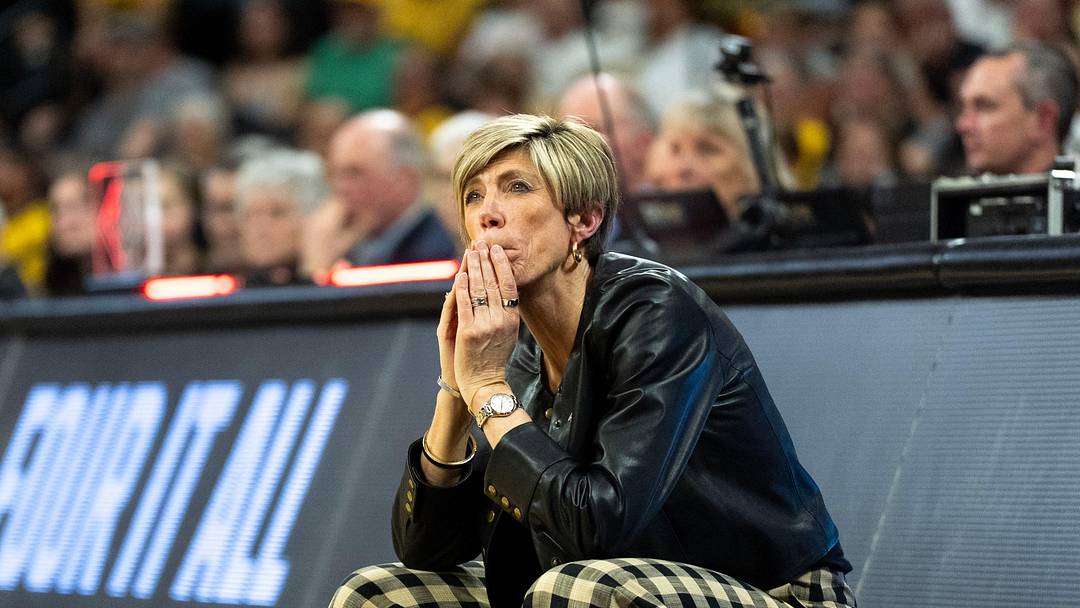 Iowa Hawkeyes head coach Jan Jensen