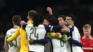 Spurs players celebrate on Thursday 