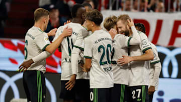 Bayern Munich players celebrating win against Werder Bremen.