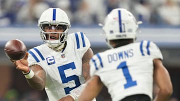 Indianapolis Colts quarterback Anthony Richardson (5) passes to Indianapolis Colts wide receiver Josh Downs (1) on Sunday, Dec. 22, 2024, during a game against the Tennessee Titans at Lucas Oil Stadium in Indianapolis. 