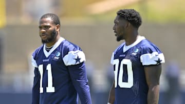 Jul 26, 2023; Oxnard, CA, USA; Dallas Cowboys linebacker Micah Parsons (11) and Dallas Cowboys defensive end DeMarcus Lawrence (90) walk on the field during training camp drill at River Ridge Playing Fields in Oxnard, CA. Mandatory Credit: Jayne Kamin-Oncea-Imagn Images