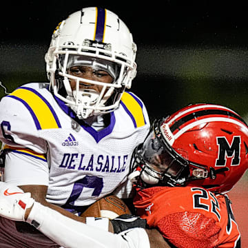 Warren De La Salle wide receiver Cam Flowers runs against Orchard Lake St. Mary's during the second half at Orchard Lake St. Mary's in West Bloomfield Township on Friday, September 13, 2024.