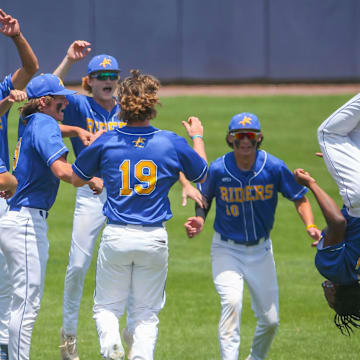 Caesar Rodney's Jaidrian Sanchez flips as the Riders celebrate a 1-0 win over Sussex Tech in the 2024 state semifinals.