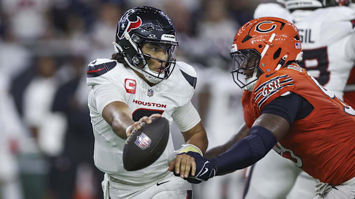 Gervon Dexter closes in on Texans QB C.J. Stroud in Sunday's loss by the Bears to the Texans, 19-13.