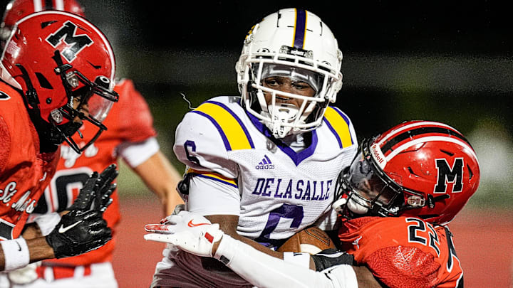 Warren De La Salle wide receiver Cam Flowers runs against Orchard Lake St. Mary's during the second half at Orchard Lake St. Mary's in West Bloomfield Township on Friday, September 13, 2024.