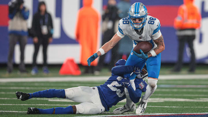 Aug 8, 2024; East Rutherford, New Jersey, USA; Detroit Lions wide receiver Kaden Davis (88) is tackled by New York Giants cornerback Tre Herndon (23) during the second half at MetLife Stadium. Mandatory Credit: Vincent Carchietta-USA TODAY Sports