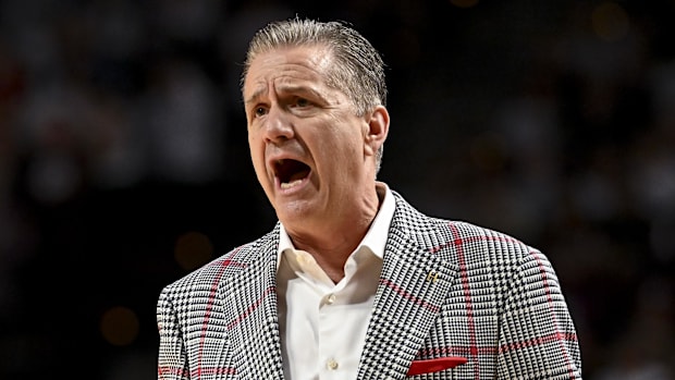 Arkansas Razorbacks coach John Calipari reacts during the first half against the Texas A&M Aggies at Reed Arena 