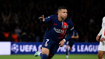 Kylian Mbappe (L) of Paris Saint-Germain FC celebrates after...