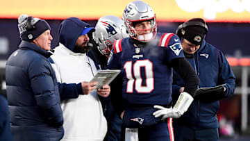 Dec 24, 2022; Foxborough, Massachusetts, USA; New England Patriots quarterback Mac Jones (10) checks