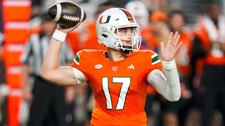 Oct 21, 2023; Miami Gardens, Florida, USA; Miami Hurricanes quarterback Emory Williams (17) throws a pass against the Clemson Tigers during the fourth quarter at Hard Rock Stadium. Mandatory Credit: Rich Storry-Imagn Images