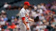 Apr 12, 2023; Denver, Colorado, USA; St. Louis Cardinals starting pitcher Jack Flaherty (22) tosses the ball into his glove on the mound in the first inning against the Colorado Rockies at Coors Field. Mandatory Credit: Isaiah J. Downing-USA TODAY Sports