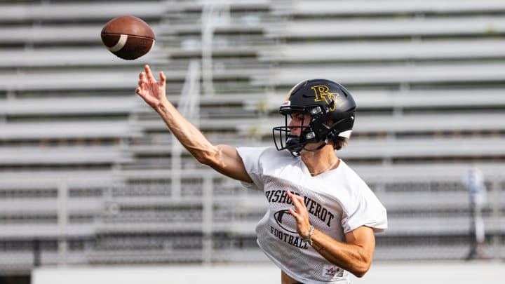 Carter Smith, the starting quarterback for the Bishop Verot High School football team passes during a practice at the school on Tuesday, July 30, 2024.