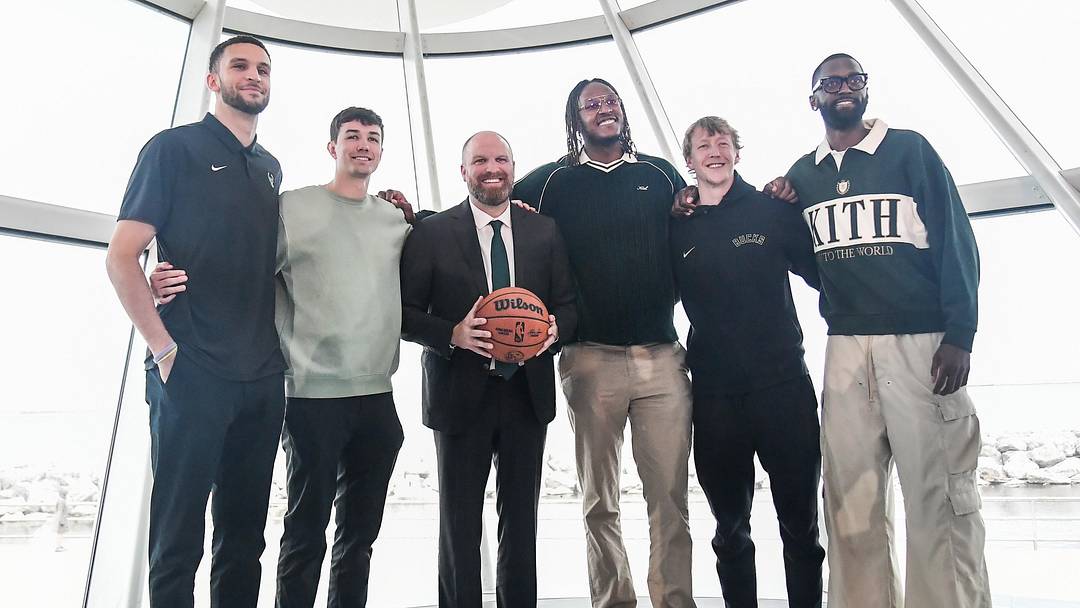 May 6, 2026; Milwaukee, WI, USA;  Milwaukee Bucks new head coach Taylor Jenkins poses with players at a press conference at the Milwaukee Art Museum. Mandatory Credit: Benny Sieu-Imagn Images