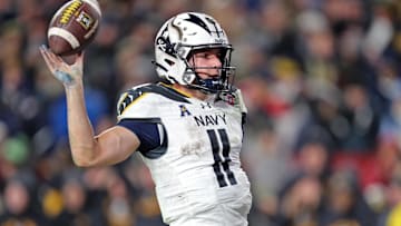 Dec 14, 2024; Landover, Maryland, USA; Navy Midshipmen quarterback Blake Horvath (11) celebrates his touchdown against the Army Black Knights during the second half of the the 125th Army-Navy game at Northwest Stadium. Mandatory Credit: Danny Wild-Imagn Images
