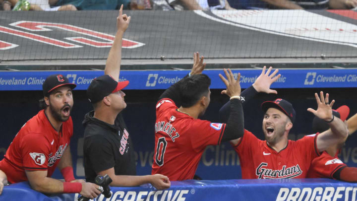 Aug 24, 2024; Cleveland, Ohio, USA; The Cleveland Guardians celebrate in the dugout a home run by Jhonkensy Noel during the third inning against the Texas Rangers at Progressive Field. Mandatory Credit: David Richard-USA TODAY Sports