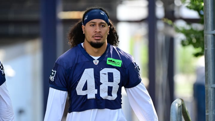 Jul 26, 2023; Foxborough, MA, USA; New England Patriots linebacker Jahlani Tavai (48) makes his way to the practice fields for  training camp at Gillette Stadium. Mandatory Credit: Eric Canha-USA TODAY Sports