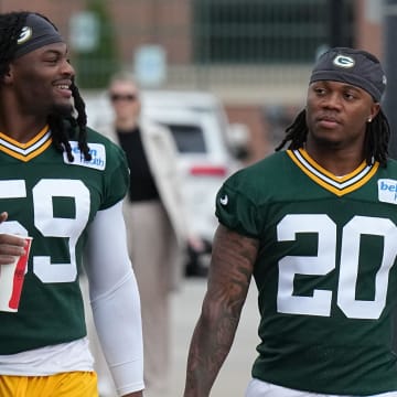 Linebacker Ty’Ron Hopper (59) and Javon Bullard arrive for organized team activities for the Green Bay Packers Tuesday, May 21, 2024 in Green Bay, Wisconsin.