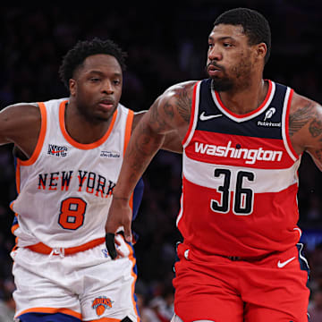 Mar 22, 2025; New York, New York, USA; Washington Wizards guard Marcus Smart (36) dribbles up court in front of New York Knicks forward OG Anunoby (8) during the second half at Madison Square Garden. Mandatory Credit: Vincent Carchietta-Imagn Images
