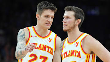 Vit Krejci #27 and Garrison Mathews #25 of the Atlanta Hawks